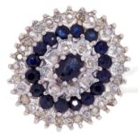 A SAPPHIRE AND DIAMOND CLUSTER RING IN 9CT. GOLD, BIRMINGHAM 1979, 5.8G, SIZE K