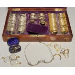 A VICTORIAN MAHOGANY CASE OF OPTOMETRISTS INSTRUMENTS, THE CASE MOUNTED WITH A BRASS PLAQUE