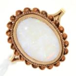 AN OPAL RING, IN 9CT GOLD, 3.3G, SIZE L½ Condition report  The opal of good polish, marks obscured