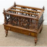 A VICTORIAN WALNUT CANTERBURY, C1870 WITH TURNED FINIALS, FRETWORK SIDES AND DRAWER, BRASS