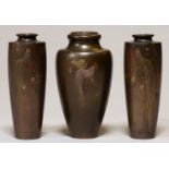 ONE AND A SIMILAR PAIR OF JAPANESE BRONZE VASES, KYOTO, MEIJI PERIOD, INLAID AND ENGRAVED WITH