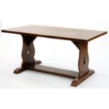 AN OAK DINING TABLE, THE TOP WITH CLEATED ENDS ON TRESTLE AND STRETCHER BASE, 76CM H; 160 X 84CM Top