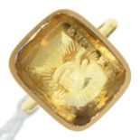 A GOLD AND CITRINE SIGNET RING, 19TH C, 3.9G, SIZE G Adapted from a seal; light wear consistent with