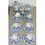 A GERMAN PORCELAIN BLUE AND WHITE ONION PATTERN TEA AND COFFEE SERVICE IN MEISSEN STYLE, 20TH C As a