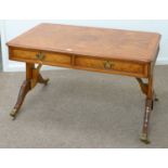 A YEW WOOD LIBRARY TABLE, 20TH C, IN REGENCY STYLE, THE CUT CORNERED TOP FITTED WITH MOULDED DRAWERS