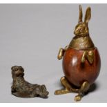 AN UNUSUAL ZOOMORPHIC HARE NOVELTY BRONZE MOUNTED COCONUT TABLE SNUFF BOX, C1900, 21CM H, LID