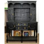 A GEOMETRICALLY MOULDED OAK DRESSER, EARLY 20TH C IN JACOBEAN STYLE WITH BRASS DROP HANDLES, LATER