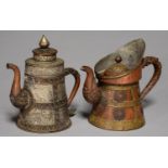 A TIBETAN COPPER AND BRASS TEAPOT AND COVER AND ANOTHER OF TINNED, FILIGREE DECORATED FORM, EARLY
