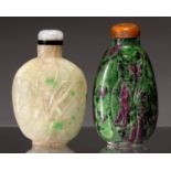 A CHINESE HARDSTONE BOTTLE, POST 1900, OF RUBY IN ZOISITE, CARVED IN SHALLOW RELIEF WITH AN