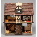 A PAINTED WOOD DOLL'S HOUSE, 1930'S, OF HALF TIMBERED TYPE WITH LINOLEUM (?) TILED ROOF, PARTLY