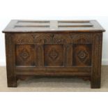 A CHARLES II JOINED OAK CHEST, LATE 17TH C, THE THREE PANEL FRONT CARVED AT LATER DATE WITH LUNETTES