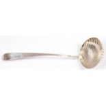 AN IRISH GEORGE III SILVER SOUP LADLE, OF BRIGHT CUT IRISH POINTED OLD ENGLISH PATTERN WITH SHELL