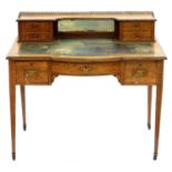 A VICTORIAN ROSEWOOD INLAID AND PEN WORK BOW CENTRED WRITING TABLE WITH TOOLED LEATHER TOP, ON