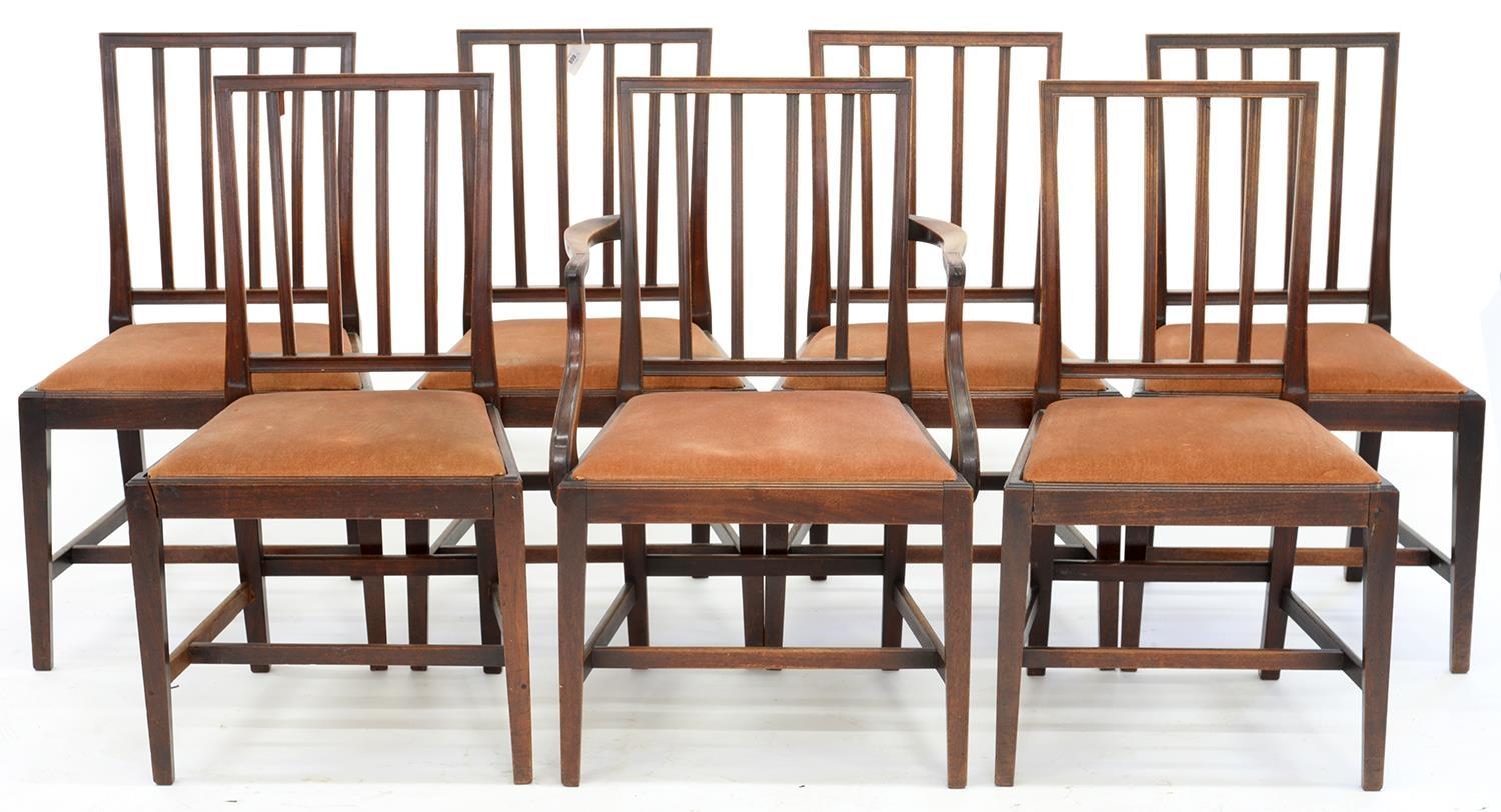 A SET OF SEVEN MAHOGANY DINING CHAIRS, INCLUDING ONE ELBOW CHAIR, ON SQUARE TAPERING LEGS, EARLY