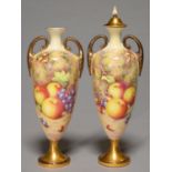 A PAIR OF ROYAL WORCESTER VASES AND COVER, POST-1963, PAINTED BY FREEMAN, BOTH SIGNED, WITH FRUIT