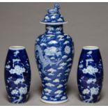 A CHINESE BLUE AND WHITE DRAGONS VASE AND COVER, WITH CRACKED ICE GROUND, 29CM H, KANGXI MARK AND