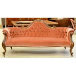 A VICTORIAN MAHOGANY SOFA, C1870, THE UNDULATING BACK WITH ROUNDED ENDS AND ARCHED CENTRE, CRESTED
