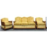 A WALNUT AND DOUBLE CANED BERGERE THREE PIECE SUITE, SOFA 166CM W, ARMCHAIR 69CM W Minor scuffs