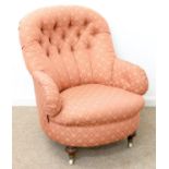 A VICTORIAN ARMCHAIR, C1880,   UPHOLSTERED IN  BUTTONED PINK TRELLIS FABRIC, ON TURNED WALNUT FEET