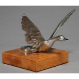 VINTAGE MOTORING. A CHROMIUM PLATED FLYING BIRD CAR RADIATOR MASCOT, 1930'S - 50'S, IN THE FORM OF A