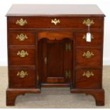 A VICTORIAN  MAHOGANY KNEEHOLE DESK OR DRESSING TABLE, LATE 19TH C IN GEORGE II STYLE, FITTED WITH