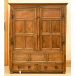 A JOINED OAK PRESS, 18TH C, WITH CAVETTO CORNICE, THE PAIR OF FIVE PANEL DOORS ABOVE PANELLED BASE
