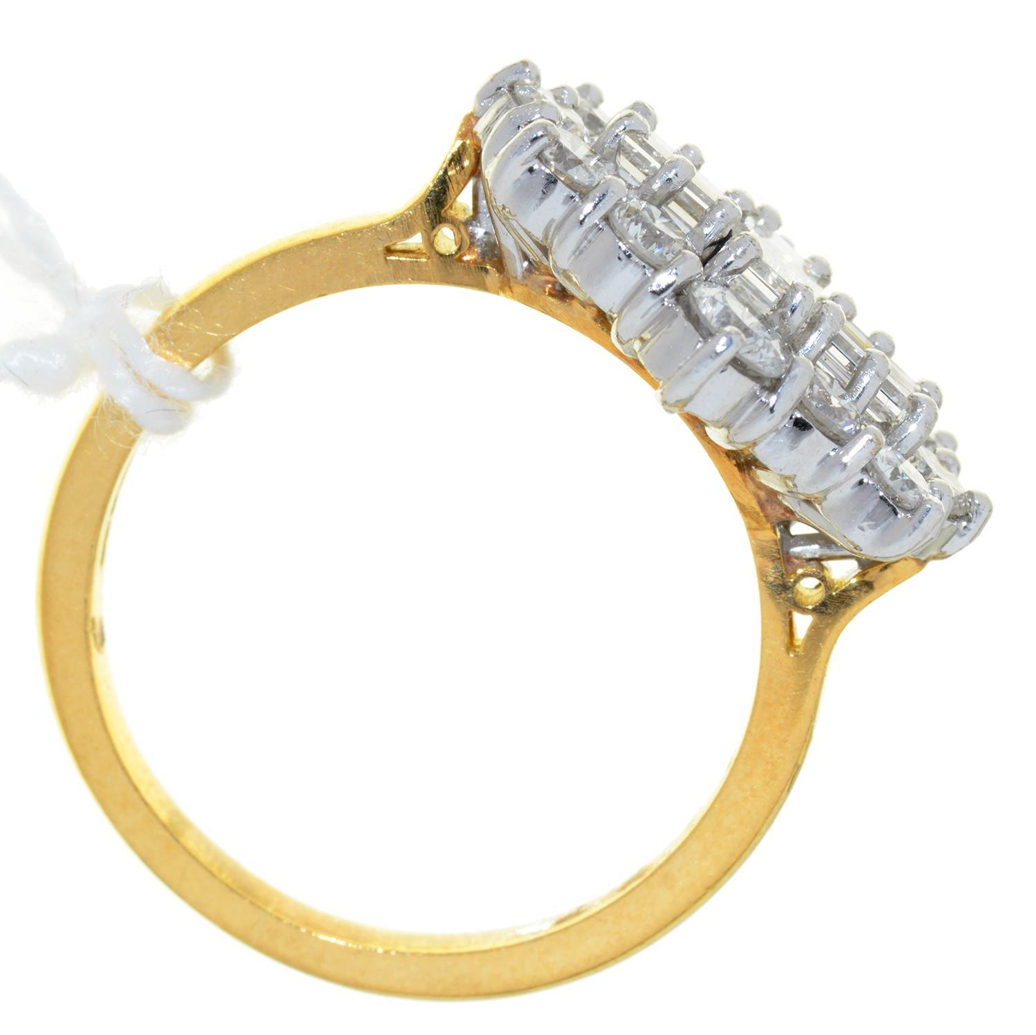 A DIAMOND CLUSTER RING WITH THREE LARGER CENTRAL EMERALD CUT DIAMONDS, IN 18CT GOLD, LONDON 2001, - Image 2 of 2