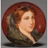 AN OUTSIDE-DECORATED MINTON'S EARTHENWARE DISH, C1880, PAINTED WITH THE HEAD OF A YOUNG WOMAN PARTLY