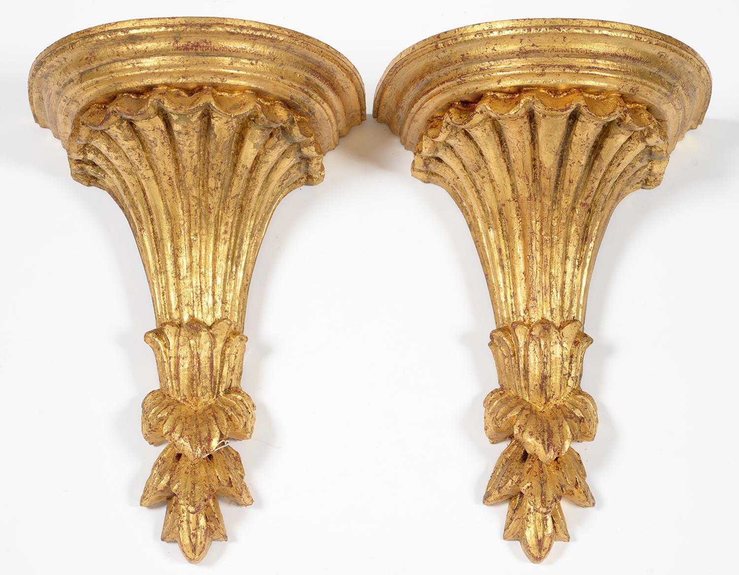 A PAIR OF NEO CLASSICAL STYLE GILT COMPOSITION WALL BRACKETS, 27.5CM H Good condition