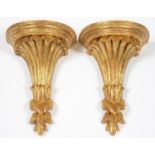 A PAIR OF NEO CLASSICAL STYLE GILT COMPOSITION WALL BRACKETS, 27.5CM H Good condition