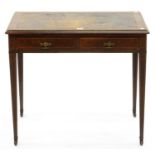 A VICTORIAN INLAID MAHOGANY WRITING TABLE, TOOLED LEATHER TOP ON SQUARE TAPERING LEGS AND POTTERY