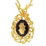 A 9CT GOLD AND SMOKY CITRINE ABSTRACT PENDANT, OF OPENWORK DESIGN, ON INTEGRAL GOLD NECKLACE,