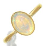 AN OPAL RING, IN GOLD, MARKED 18CT, 2.1G, SIZE N Polish of opal scratched and now rather dull; light