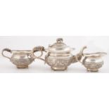 AN ANGLO-INDIAN SILVER TEA SERVICE, C1910, OF HEAVY GAUGE WITH FINE CAST ELEPHANT HEAD HANDLES AND
