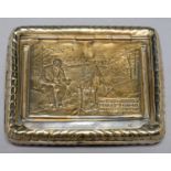 A RUSSIAN SILVERED METAL TOBACCO BOX, C1920, THE LID EMBOSSED WITH LENIN SEATED BY A CAMP FIRE AND