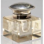 A NORTH AMERICAN SILVER MOUNTED GLASS INKWELL, EARLY 20TH C, THE FLARED AND DOMED CAP WITH BEADED