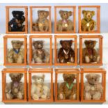 TWELVE STEIFF TEDDY BEARS, LATE 20TH / EARLY 21ST C, EACH IN ACRYLIC GLAZED LIGHTWOOD DISPLAY CASE