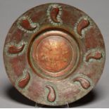 A MIDDLE EASTERN TINNED COPPER DISH, 19TH/EARLY 20TH C, THE WIDE BORDER EMBOSSED WITH BOTEH AND