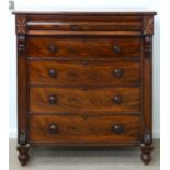 A VICTORIAN MAHOGANY CHEST OF DRAWERS, C1870 WITH MOULDED FRIEZE DRAWER BETWEEN CARVED FLOWERHEADS