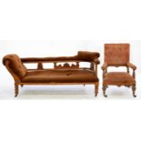 A VICTORIAN CARVED WALNUT CHAISE LOUNGE UPHOLSTERED IN BROWN BUTTON BACK FABRIC, 180CM W AND A