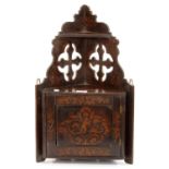 A VICTORIAN STAINED FRETWORK AND POKERWORK DECORATED WALL HANGING CORNER CUPBOARD, 57CM H; 35 X 18CM