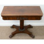 AN EARLY VICTORIAN ROSEWOOD CARD TABLE, THE FOLD-OVER TOP ON TAPERED PILLAR, CALYX AND PLATFORM,