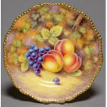 A ROYAL WORCESTER PLATE, 1964-71, PAINTED BY J. SMITH, SIGNED, WITH AN ALL OVER STILL LIFE OF