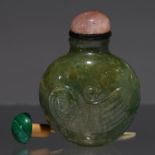 A CHINESE JADE SNUFF BOTTLE, POST 1900, CARVED IN SHALLOW RELIEF WITH PHOENIX, ROSE QUARTZ