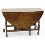A GEORGE III OAK GATELEG TABLE, 76CM H; 122 X 133CM Some movement to frame, shrinkage crack and some
