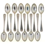 A SET OF TWELVE GEORGE V SILVER TEASPOONS, OLD ENGLISH PATTERN, BY WALKER & HALL, SHEFFIELD 1920,