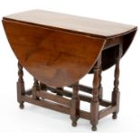 A YEW WOOD GATELEG TABLE, 74CM H; 101 X 130CM Chips and losses to base, small split to top
