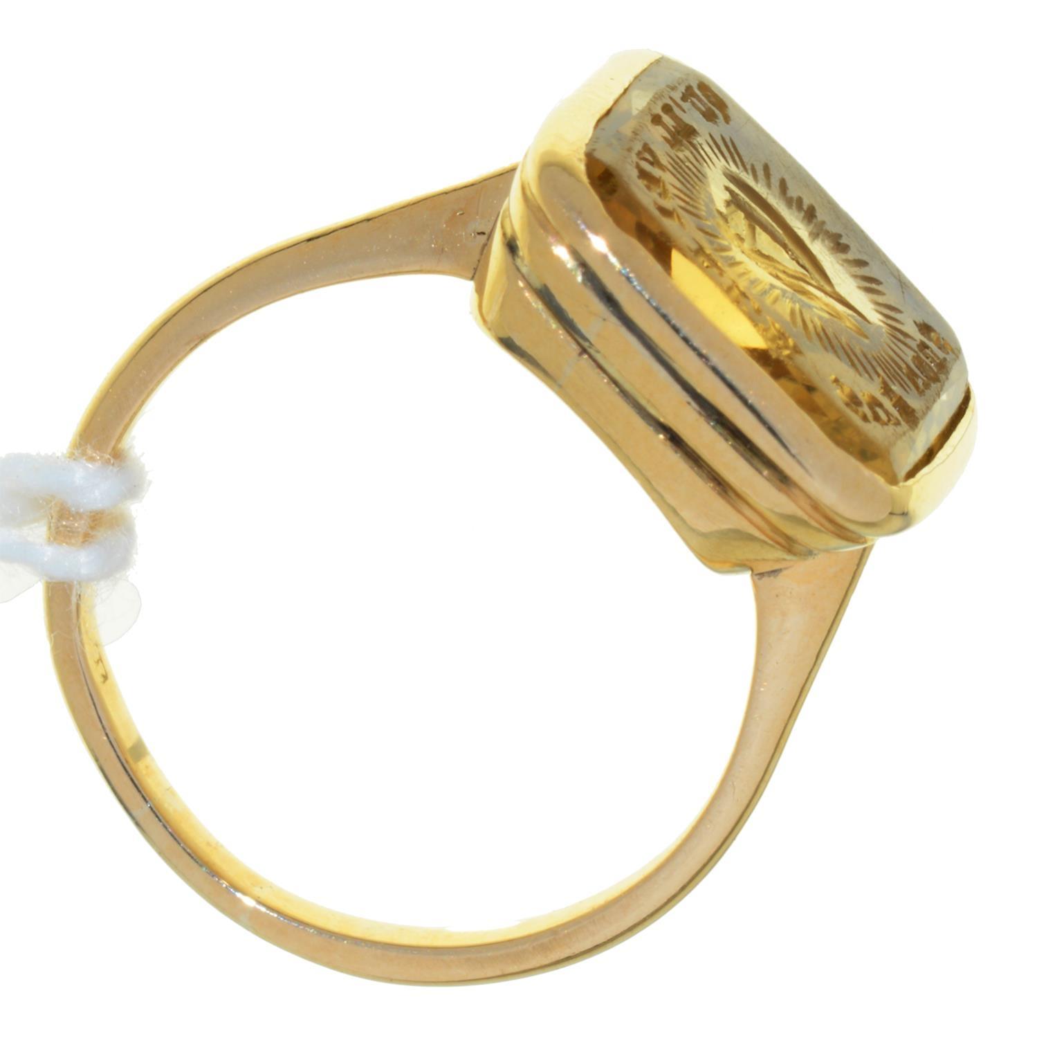 A GOLD AND CITRINE SIGNET RING, 19TH C, 3.9G, SIZE G Adapted from a seal; light wear consistent with - Image 2 of 2