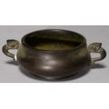 A CHINESE BRONZE CENSER, 19TH C, THE COMPRESSED BOWL WITH ZOOMORPHIC HANDLES, ON SLIGHTLY FLARED
