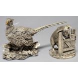 AN ELIZABETH II ELECTROFORMED AND FILLED SILVER MODEL OF A PIG AT A GATE AND A LARGER SIMILAR